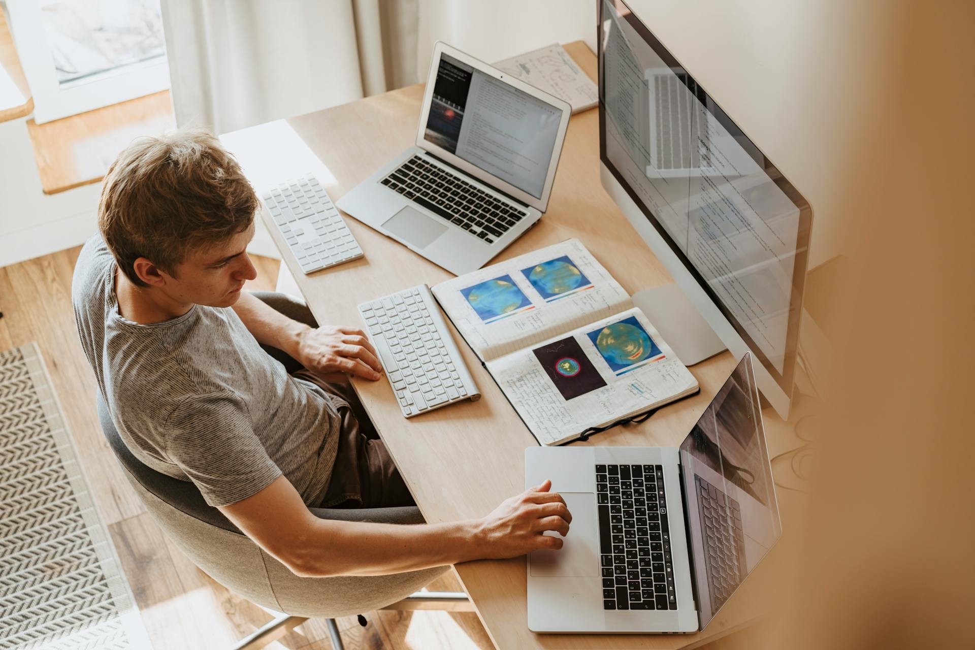 Developer desk with laptop, suggesting remote macOS signing and notarization workflows